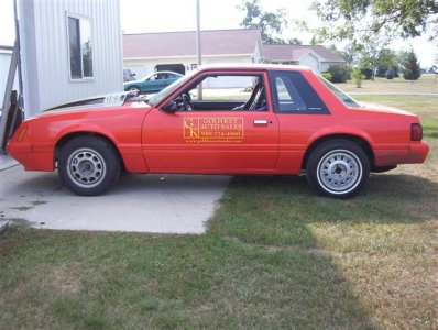 86 mustang orange outside.jpg