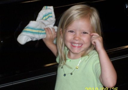 maddie cleaning car.jpg