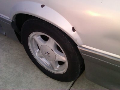 91 Mustang Drvr Side Rear Qtr hole.jpg
