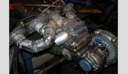 horrible-weld-beads-on-exhaust-manifold-stick-welding.jpg